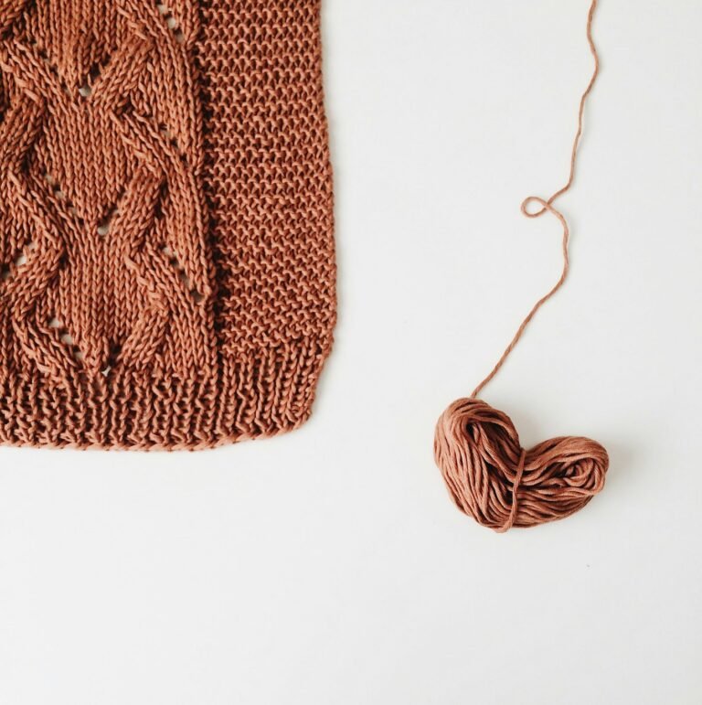 Close-up of warm brown ribbed crochet fabric